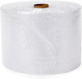 A large roll of clear bubble wrap with a small brown cardboard core visible at the top, photographed on a plain white background.