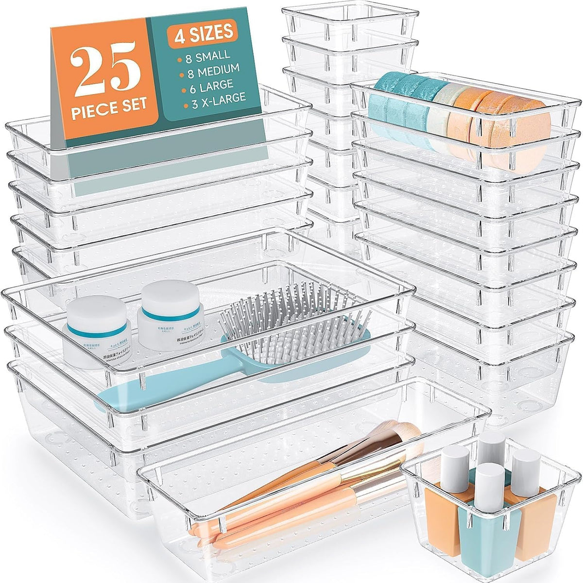 Set of clear plastic storage bins with various items on a white background